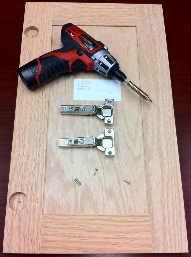 ready your hinges screws and cabinet doors